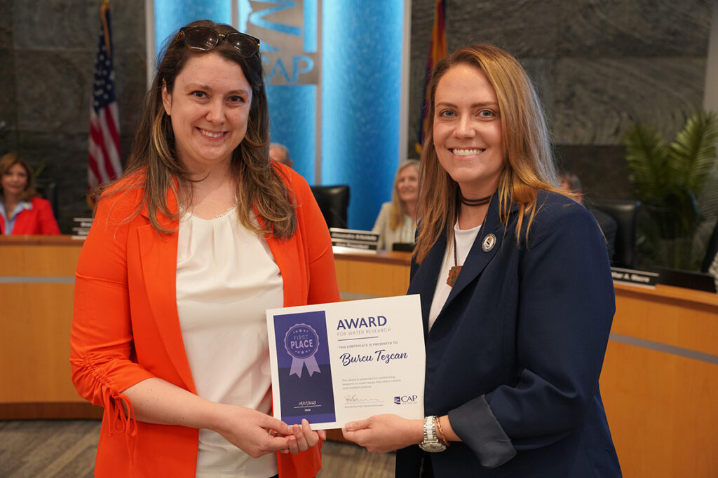 Burcu Tezcan receiving CAP award for research